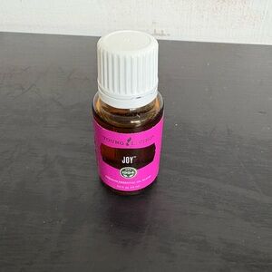 Young Living Joy Essential Oil in Pink and White